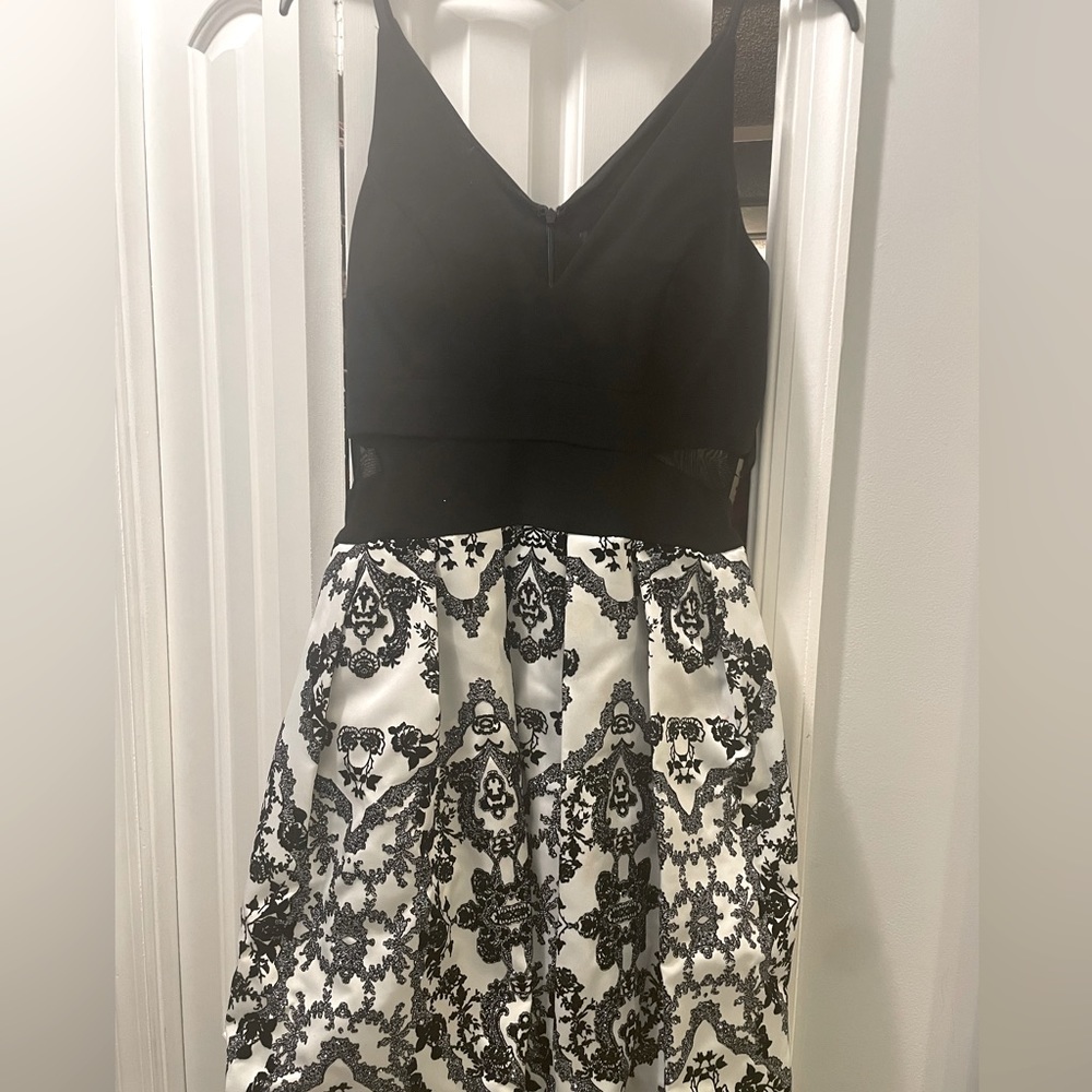 Short black tie dress. Black and white with sparkles